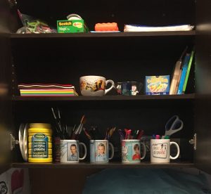 A shelf with school supplies